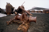 Rusting whaling equipment, winches, boilers and tanks on the beach at Whalers Bay. Deception Is. Antarctica.