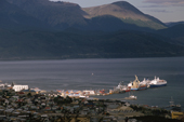 The dock area of Ushuaia is illuminated by a shaft of sunlight. Tierra del Fuego. Argentina.