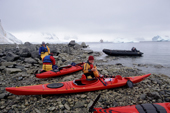 Kayakers prepare their boats before setting out for Danco Island. Antarctica