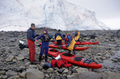 Kayakers prepare their boats before setting out for Danco Island. Antarctica