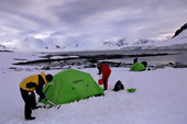 Adventure tourism, camping in Antarctica, taking down the tent at Weincke Island