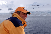 Passenger on a Quark expedition trip in the smart yellow jacket with slogan on the shoulders