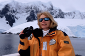 Passenger on a Quark expedition trip in the smart yellow jacket with logo.