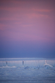 Alpenglow over a large tabular iceberg in the Weddell Sea. Antarctica