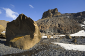 Weathered volcanic rocks stand on the beach at Brown Bluff. Tabarin Peninsula, Antarctica