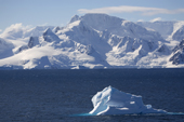 Icebergs and dramatic mountains in the Gerlache Strait. Antarctic Peninsula