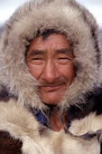 Chukchi Man, his face framed with a fur hood. Yanrakynnot, Chukotka. Siberia. 1997
