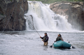 A salmon angler with his guide fly fishing in the Falls Pool on the Eastern Litza River. Kola Peninsula, NW Russia. 2005