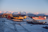 Float planes with Alaska Range mountains behind at Hood Lake. Anchorage. Alaska. 1989