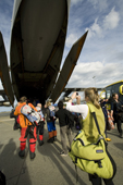 Tourists prepare to board the Ilyushin 76 that will take them to Patriot Hills, Antarctica