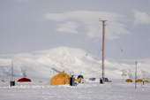 The Radio tent and mast at Patriot Hills camp, with a backdrop of the Independence Range. Antarctica