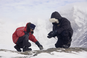 Field Guide Denise with Lee, a visitor to Patriot Hills. They check out Rocks on a trip to Windy Ridge. West Antarctica