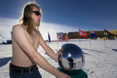 Christian Fuhrhop, German visitor to the South Pole samples the cold air at the Ceremonial Pole. Antarctica