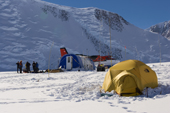 Mount Vinson Base Camp with a Twin Otter on a visit. The camp is surrounded by dramatic ice falls. Vinson Massif. Antarctica