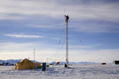 Maintenance on the Radio Mast at Patriot Hills on a day with little wind. Antarctica.