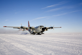 C130 equipped with skis takes off at Patriot Hills. Antarctica