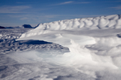 Sastrugi on the Polar Plateau by the Independence Hills and Mount Fordell. Antarctica
