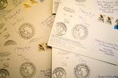 Postcards with stamps/ckops from the South Pole Station waiting to be posted. Antarctica