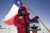 David with the Chilean Flag at the Ceremonial South Pole. Antarctica