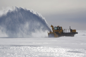Large Snow Blower clearing snow off the Blue Ice Runway at Patriot Hills. Antarctica