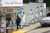 Mural of Emperor penguins descending stairs on a pavement in Ushuaia Argentina