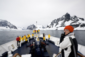 The Clipper Adventurer in the Lemaire Channel on a grey day. Antarctica