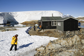Visitors to Wordie House on Winter Island, established in 1947, now an Antarctic Historic Site. Antarctica