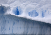 Deep shaded fissures in an Iceberg. Antarctica