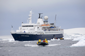 Passengers leave the Clipper Adventurer for a zodiac cruise in the Fish Islands. Antarctica