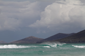 Wind blows the tops off the waves on a blowy day at The Neck, Saunders Island The Falklands