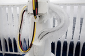 Wires on a ship in Antarctica iced up following rough passage.