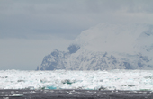 Cape Vincent, Elephant Island seen across 15 nautical miles of pack ice. South Shetland Islands. Antarctica