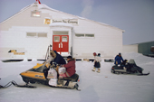 Inuit shoppers outside the old Hudson Bay Company. Store in Igloolik. Nunavut, Canada. 1987