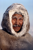 Thomasie Nutarariaq, an Inuk from Igloolik frosted up in the cold. Nunavut, Canada. 1990