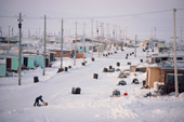 Child in the street in the residential area of the inuit settlement. Baker Lake. Nunavut. Canada. 1982