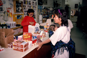 Inuit women in the small shop in Grise Fiord. Ellesmere Island, Nunavut, Canada. 1994