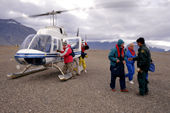 Inuit park Warden welcomes tourists from helicopters. Ellesmere Island National Park. Nunavut, Canada. 1994