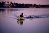 Cree trappers return from a fishing trip on Lake Bourinot, Quebec, Canada. (1988)