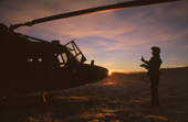 Royal Marine Lynx helicopter Pre-flight checks at sunrise. Leira Airport, Fagernes, Norway.
