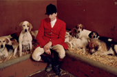 Kennel Huntsman Matthew with his hounds in their lodges after a hard days hunting. Portman Hunt, Dorset. England. 1988-89