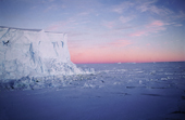Edge of the Ice shelf at 3.00am, sea ice and a sunrise. Antarctica.