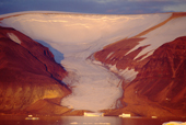 Arctic Bay, glacier with textbook terminal moraine in warm low light. Canadian Arctic