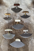 An assortment of traditional Ulu's (woman's knife) from Northwest Greenland, Canada & Alaska. These knives are primarily used for cleaning skins. they are used in coastal native communities right around the Arctic.