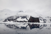 Reflections of the shore of remote Peter 1st Island. It is claimed by Norway and receives very few visitors. Antarctica