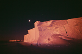 The ice cliffs of the Brunt Ice Shelf, and moon lit by the faint glow of the absent sun. Antarctica.