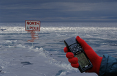 Sign at the North Pole, with a GPS, Global Positioning System. North Pole. Arctic Ocean. Digitally composed. 1998