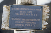 Sign in Russian & Norwegian by the remains of the hut that Nansen & Johansen overwinter ed in 1895-6. Cape Norwegia. Jackson Is.Franz Josef Land. 1998