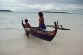 Islander from Faraulep Atoll prepares to fish in small outrigger canoe. Yap, Micronesia, Pacific. 1996