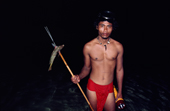 Yapese reef fisherman with fish he has speared at night. Yap Island, Caroline Islands, Micronesia, Pacific. 1996