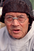 Portrait of Inuit man, Navssaq Sadorana, wearing glasses. Northwest Greenland. 1980